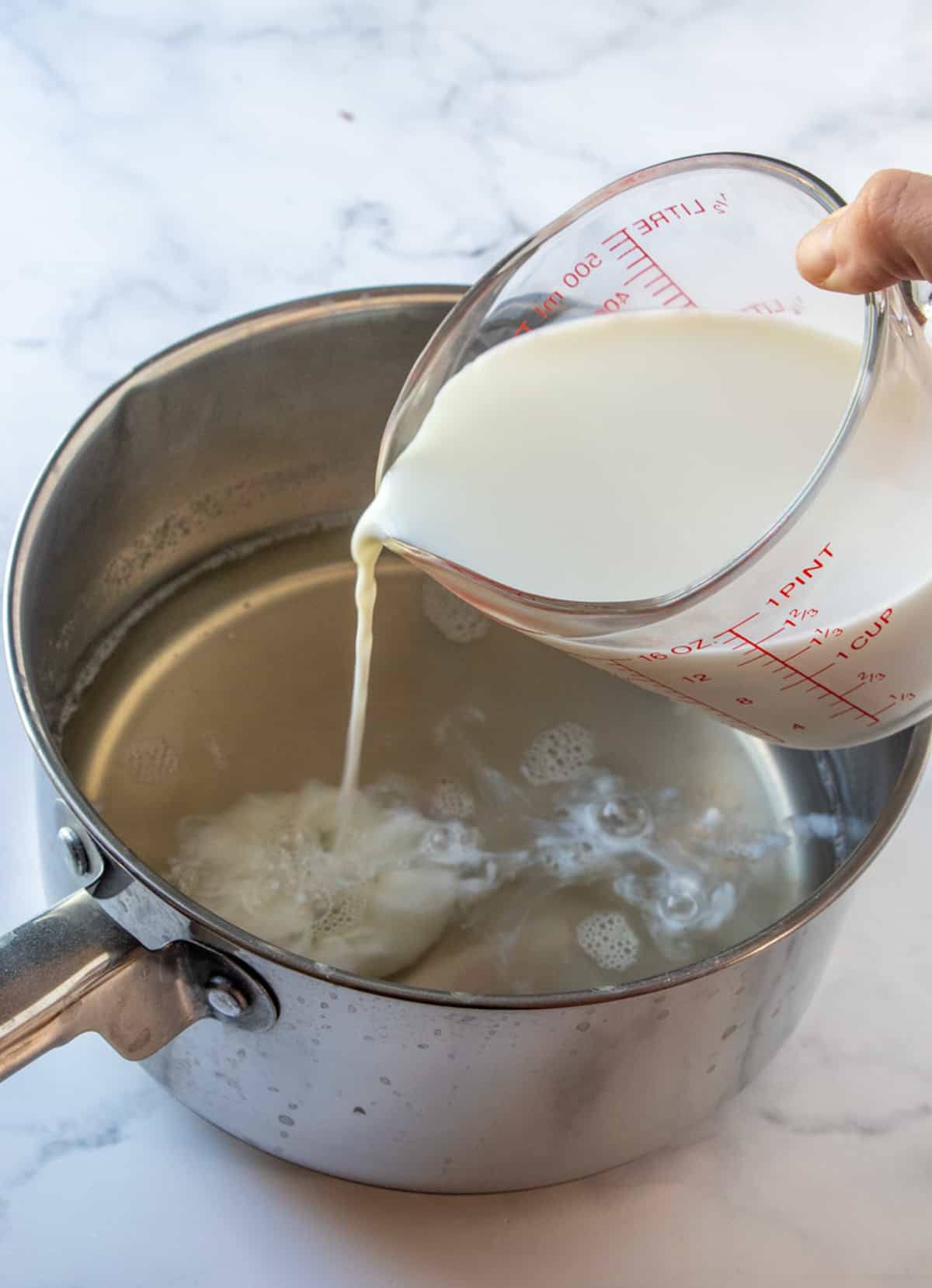 making almond tofu in saucepan