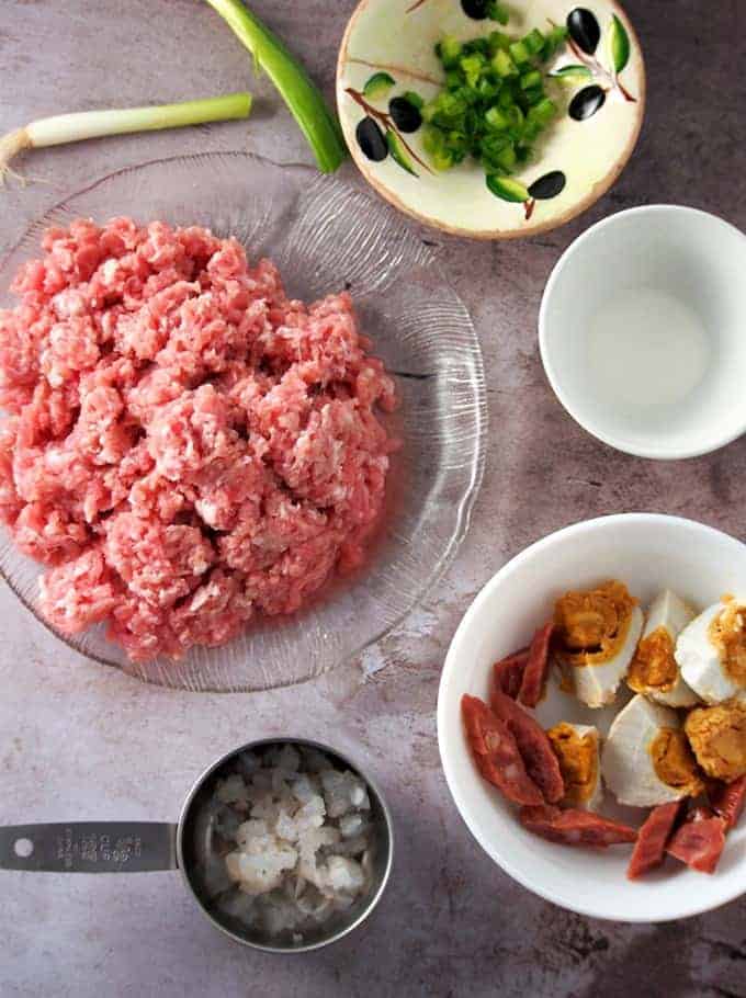 ground pork, sliced salted eggs, sliced Chinese sausage, chopped onions