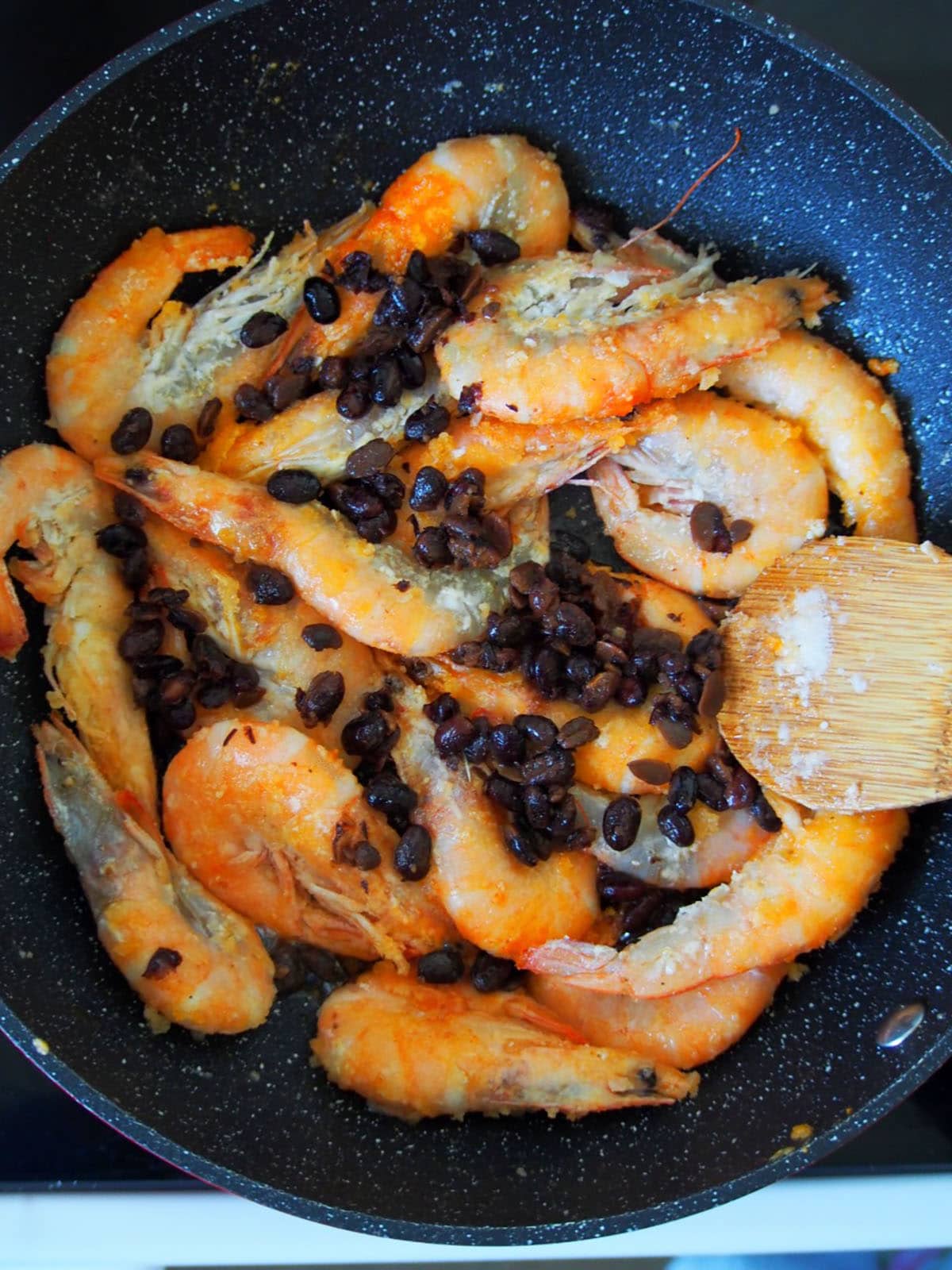 Asian shrimp stir-fry in a wok