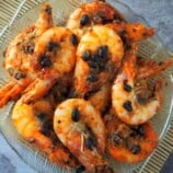 Asian shrimp stir-fry with garlic black beans on a serving plate