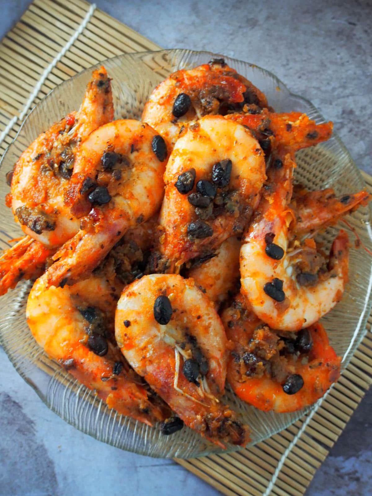 Asian shrimp stir-fry with garlic black beans on a serving plate