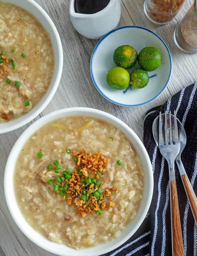 bowls of Goto with fried garlic and chopped green onions