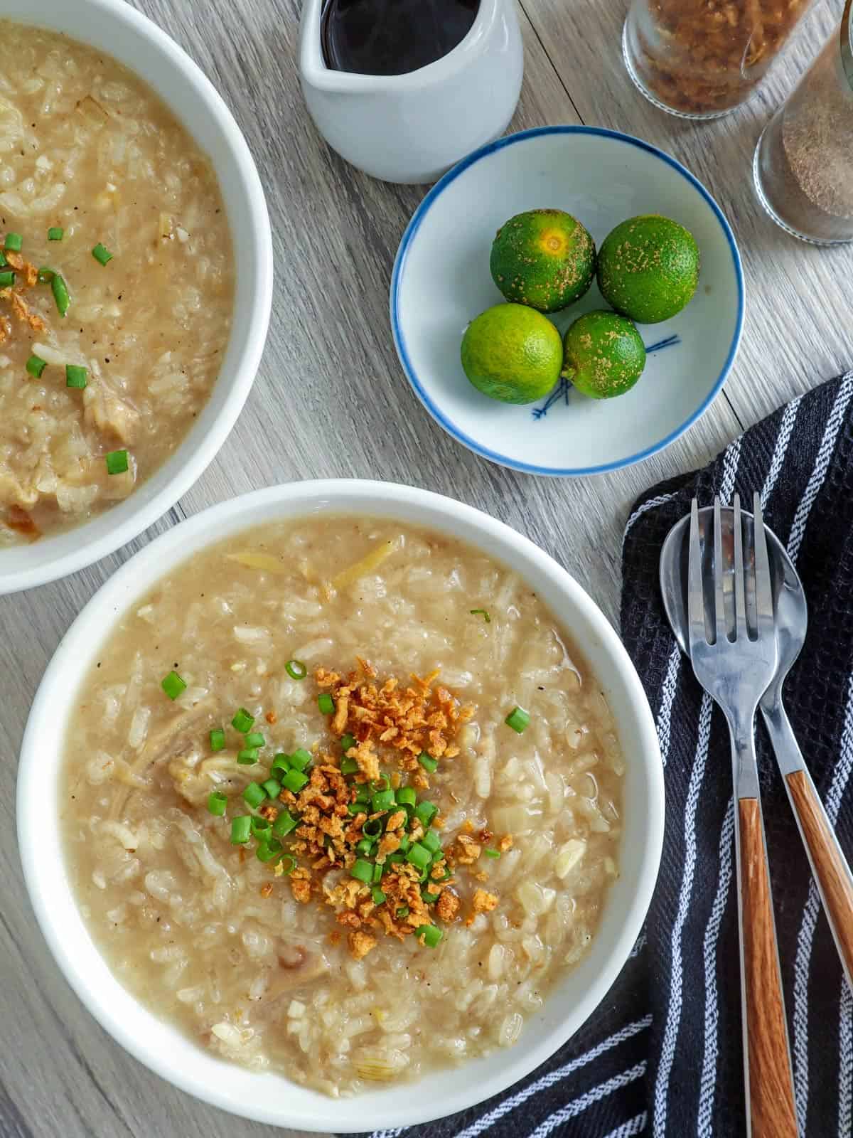 bowls of Goto with fried garlic and chopped green onions