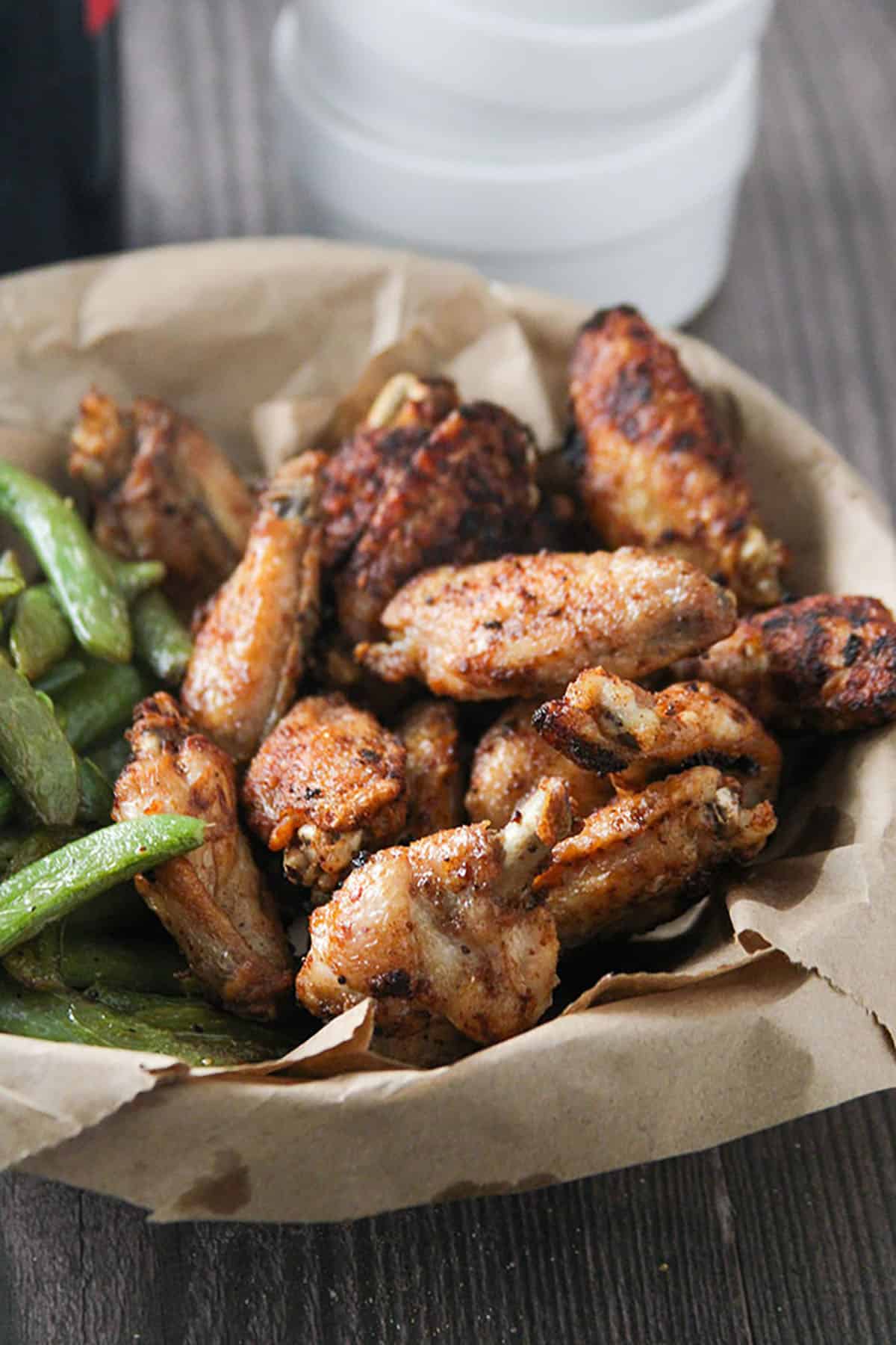 Tamarind Chicken Wings in a brown-paper lined basket