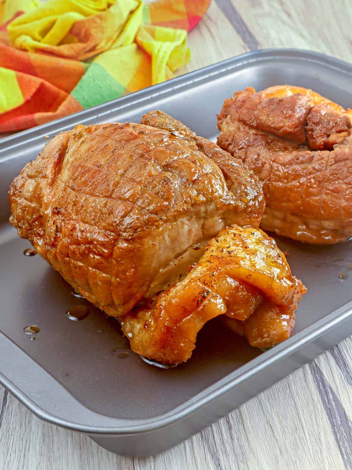 baked ham on a baking sheet