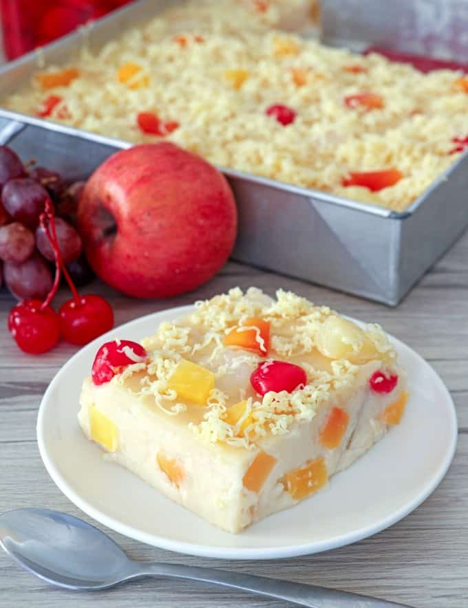 slice of fruity maja blanca on a white serving plate