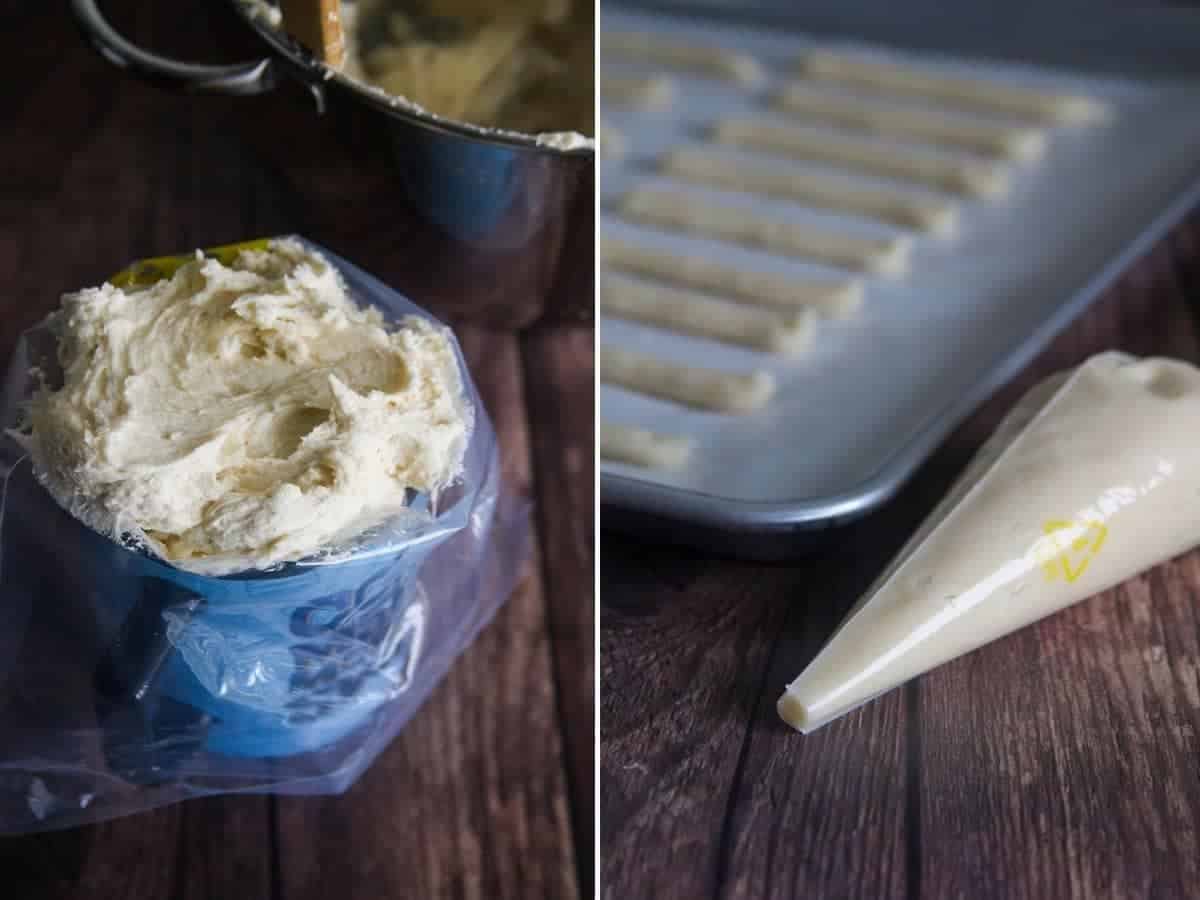 piping cat's tongue cookie dough on a parchment-lined baking sheet