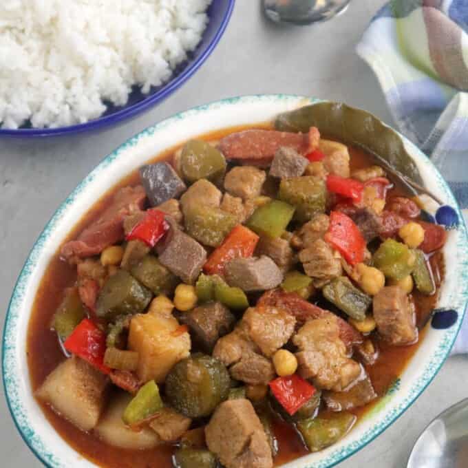 Waknatoy on a serving platter with a plate of steamed rice on the side