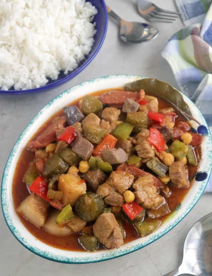 Waknatoy on a serving platter with a plate of steamed rice on the side