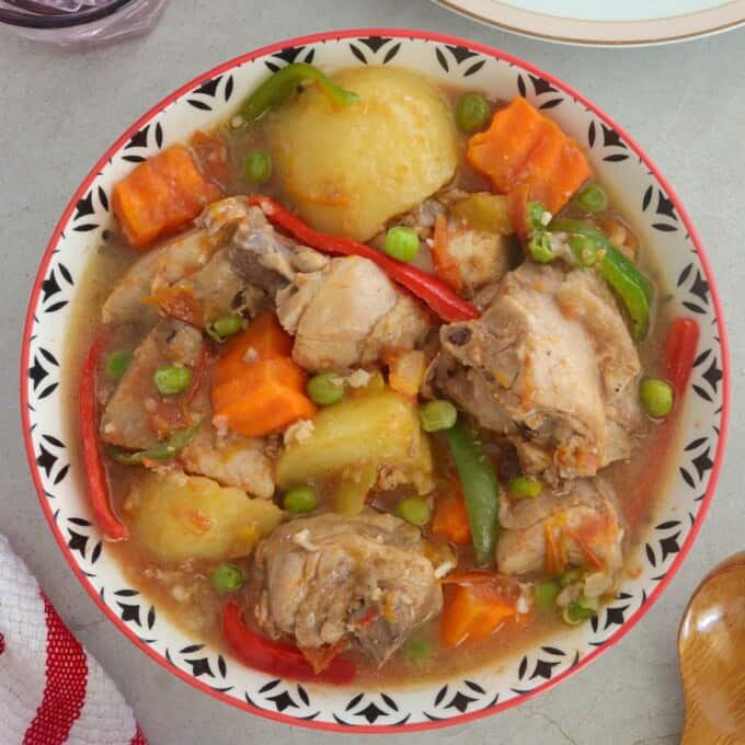 afritadang manok in a serving dish.