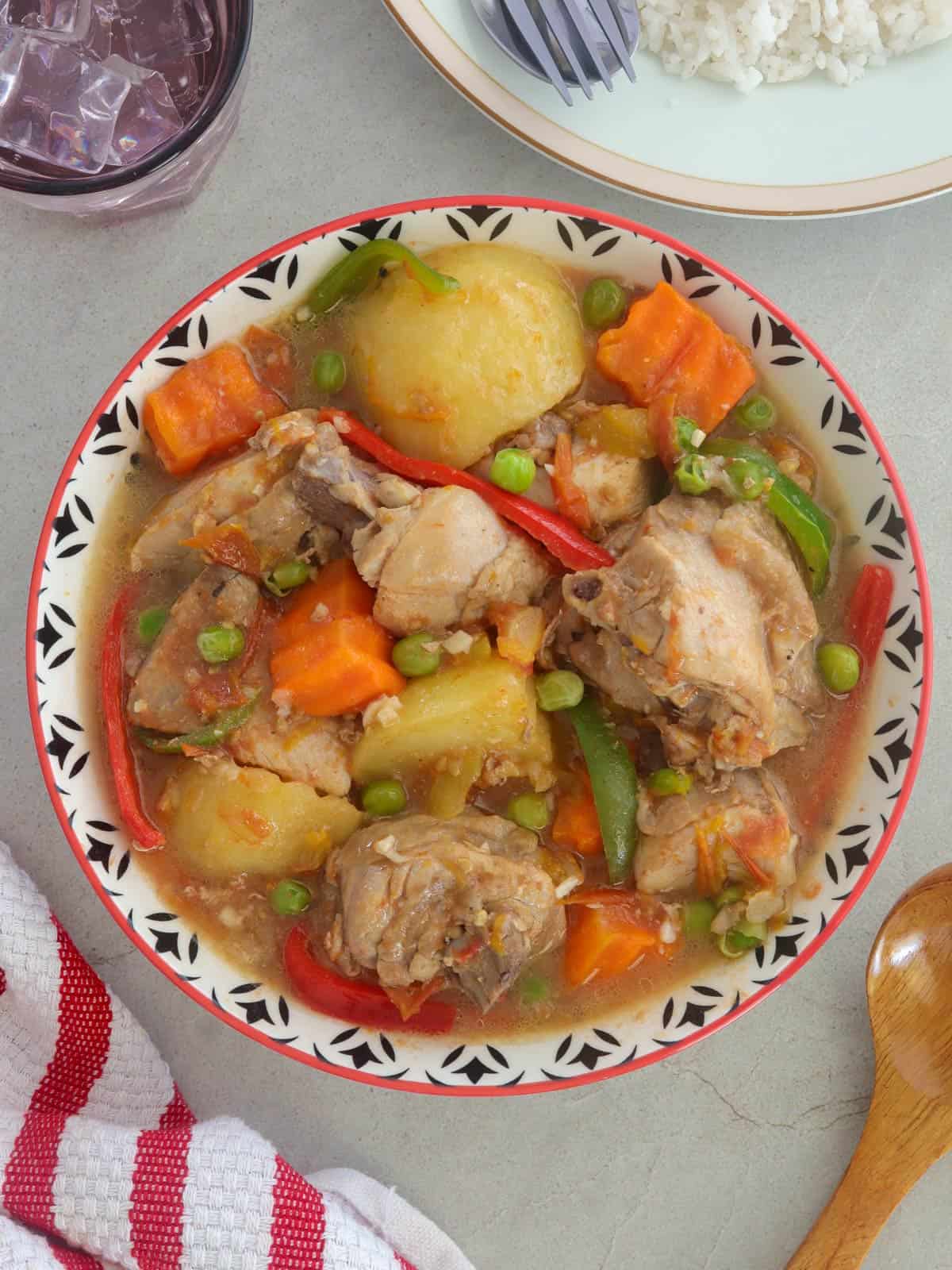 afritadang manok in a serving dish.