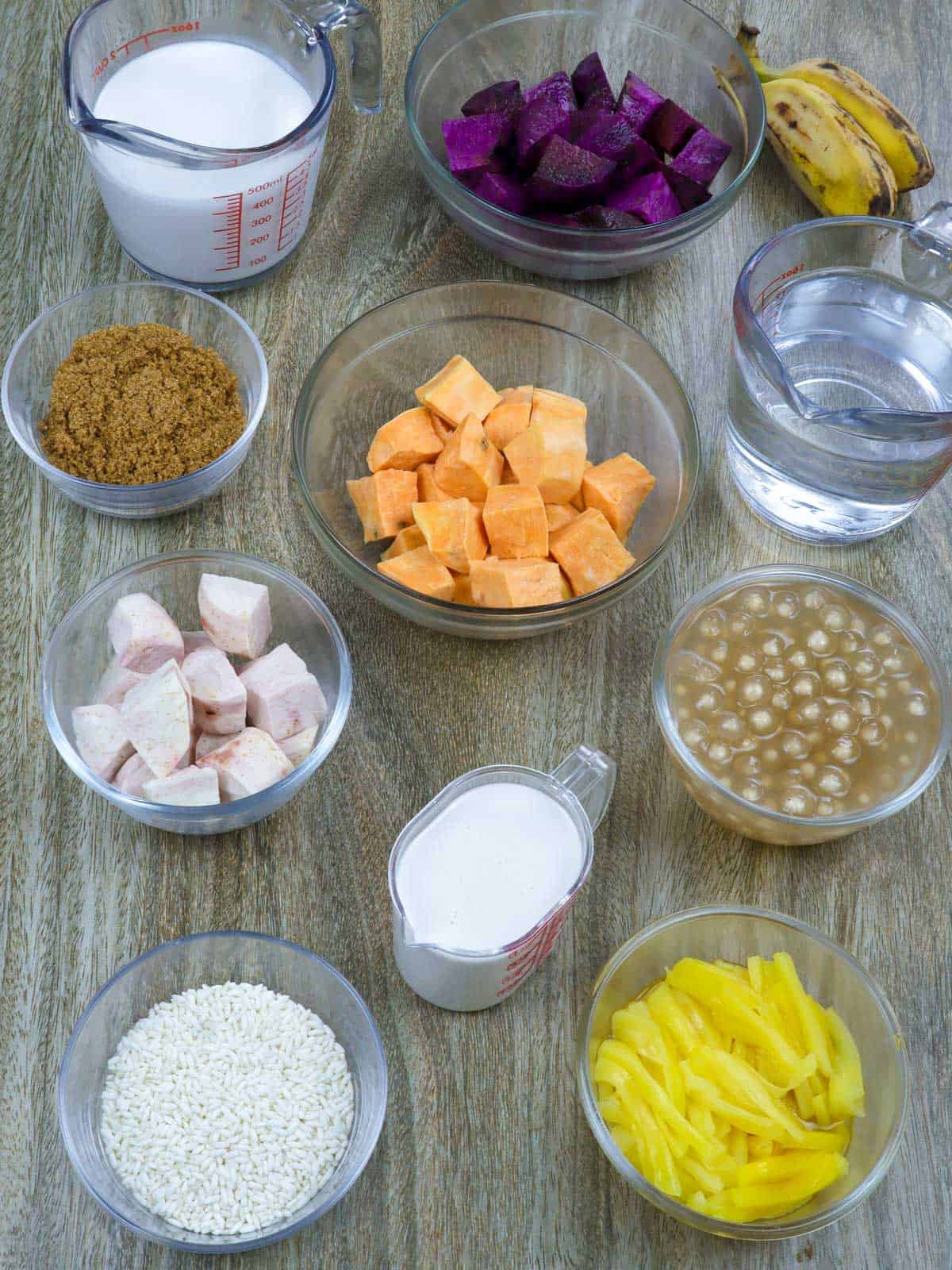 yam, saba bananas, purple yan, sago, sugar, coconut milk, glutinous rice, water, langka in bowls