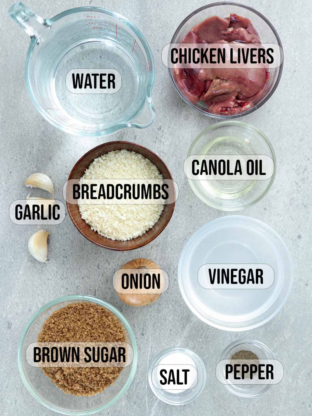 brown sugar, vinegar, onions, garlic, oil, water, liver, breadcrumbs in bowls.