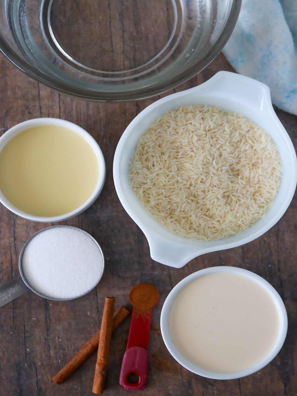 rice, evaporated milk, condensed milk, cinnamon sticks, sugar