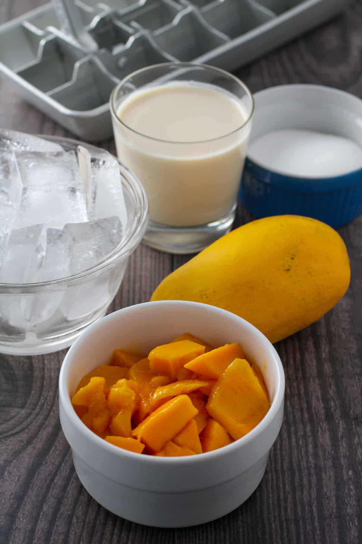 mango cubes, evaporated milk, mango, sugar, ice