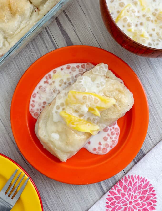 biibngkoy with ginataan sauce, sago, and langka on an orange plate.