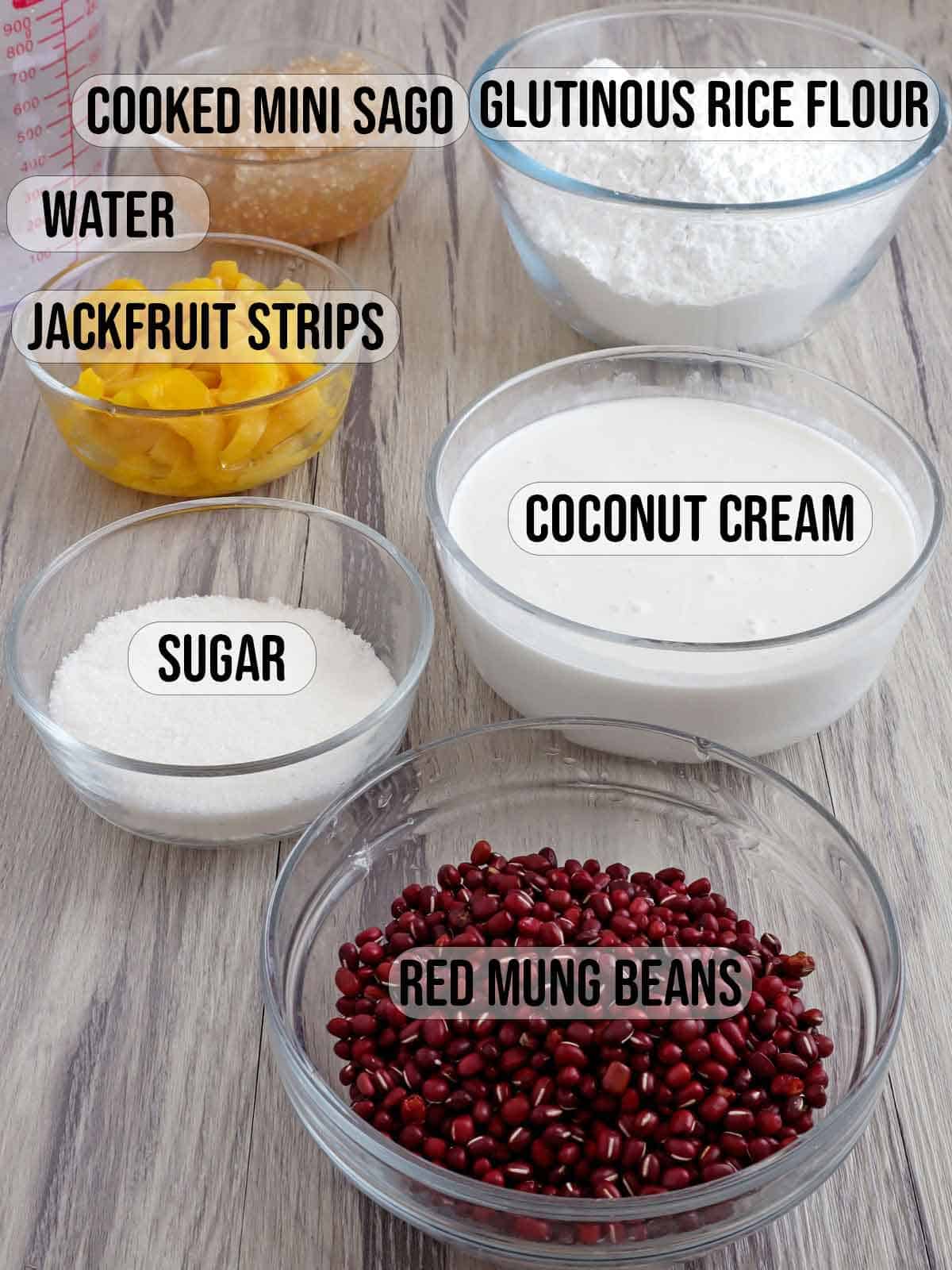 sugar, jackfruit strips, coconut cream, sago, water, glutinous rice flour, red mung beans in bowls.