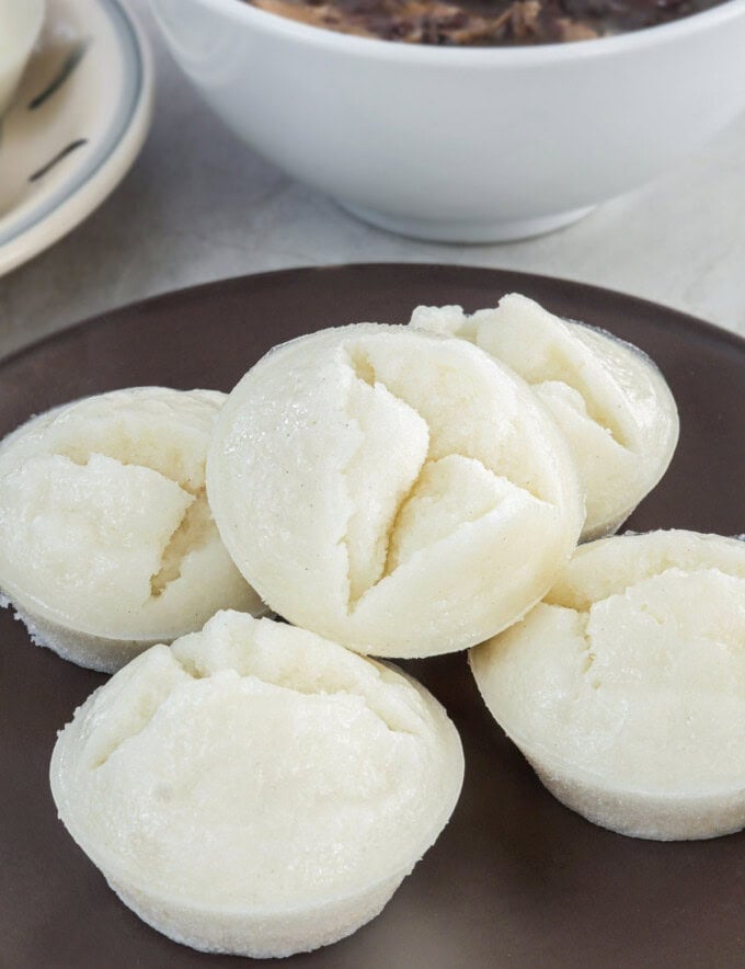 puto on a wooden serving plate.