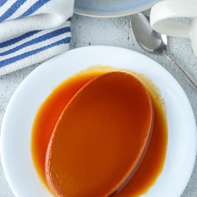 Dulce de Leche Flan on a white serving platter.