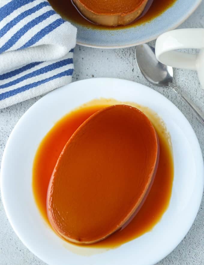 Dulce de Leche Flan on a white serving platter.