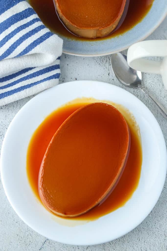 Dulce de Leche Flan on a white serving platter.