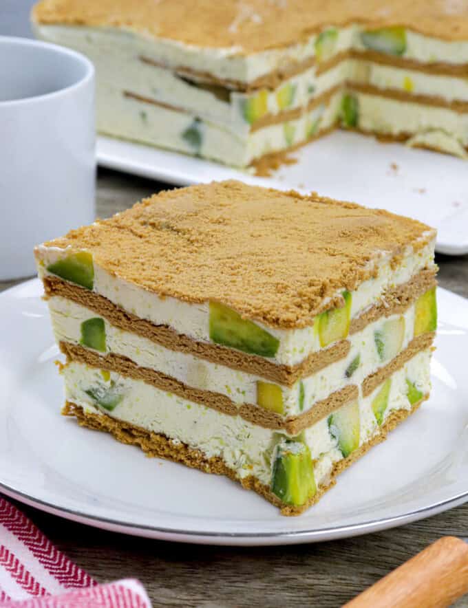 slice of avocado graham cake on a white plate.