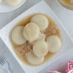 Inday-Inday with coconut sauce on a white serving platter.