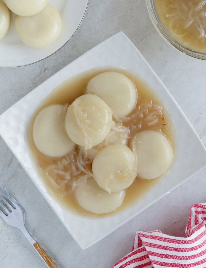 Inday-Inday with coconut sauce on a white serving platter.